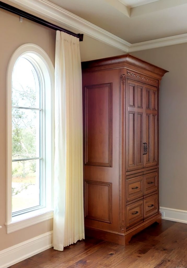 European Estate Armoire custom made fine furniture in cherry wood in amber stain with silky smooth, waxed finish